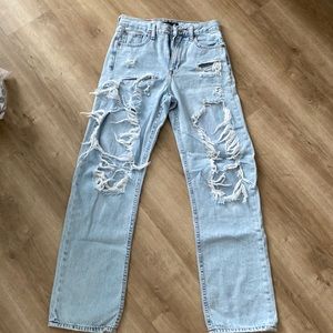 Used high rise ripped jeans for youth girls. Size 2 (US)